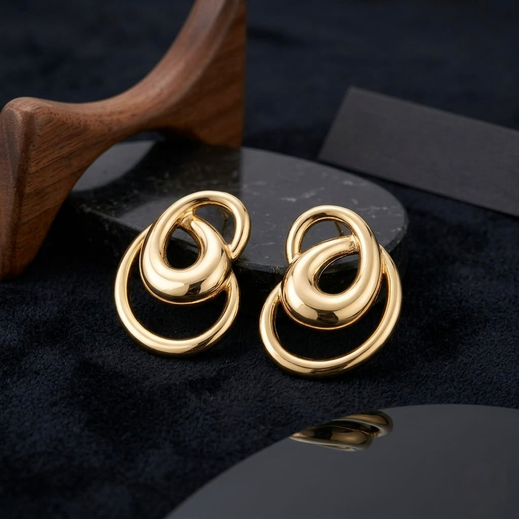 Jalparee "Aura" Metallic Fluid Loop Statement Earrings – Chic Western Studs
