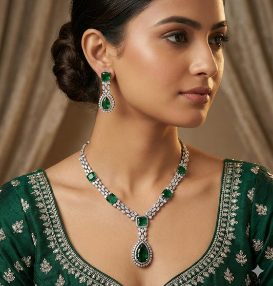 Elegant Jalparee AD ( American Diamond) and vivid emerald green stone jewelry set, consisting of a choker-style necklace with square and teardrp cut stones and complementary drop earrings.