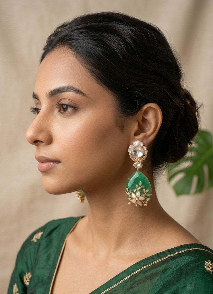 Jalparee: 18K Gold Plated Kundan and Emerald-Green Dangler Earrings with Mother-of-Pearl Floral Accents
