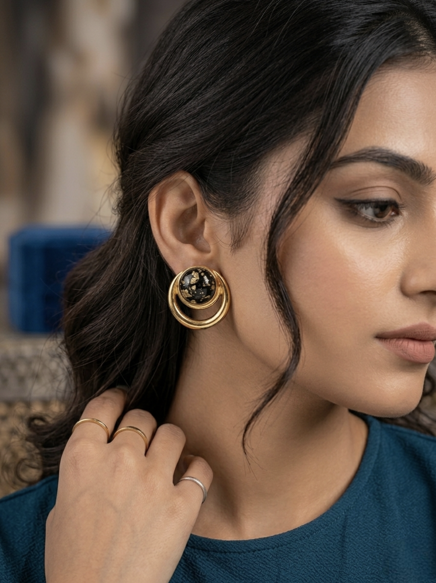 Jalparee Gold-Plated Celestial Orbit Stud Earrings with Black and Gold Speckled Resin