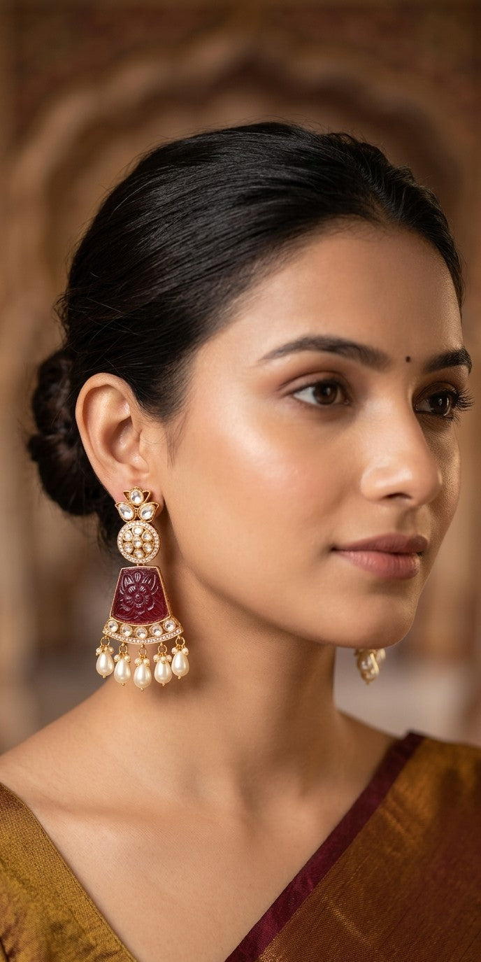 Jalparee Heritage Collection: Intricately Carved Maroon Panel and Kundan-Set Chandelier Jhumka Earrings with Multiple Pearl Drops