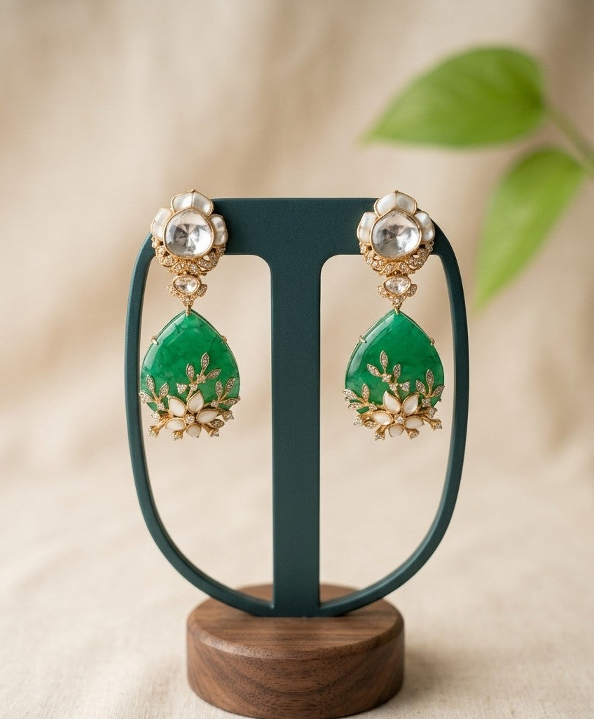 Jalparee: 18K Gold Plated Kundan and Emerald-Green Dangler Earrings with Mother-of-Pearl Floral Accents