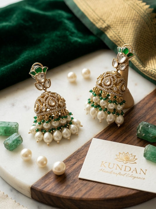 Traditional Gold-Plated Kundan Jhumka Earrings with Pearl Clusters and Emerald Beads - by Jalparee