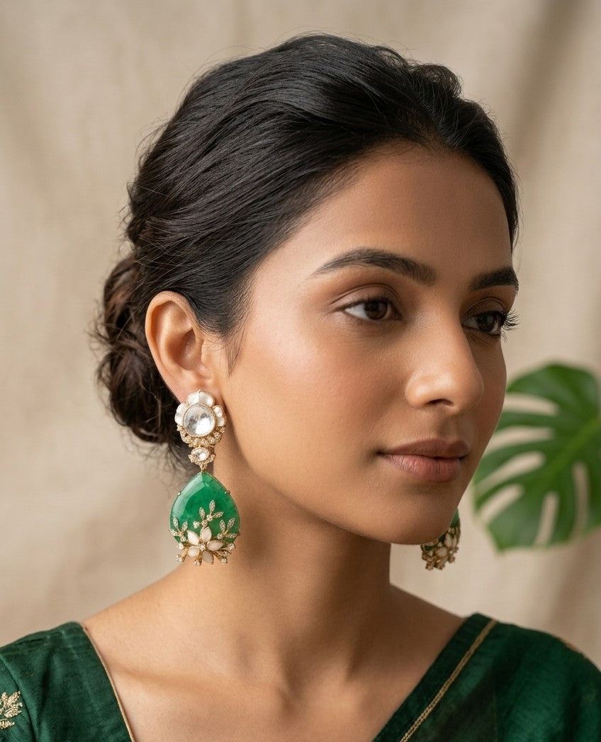 Jalparee: 18K Gold Plated Kundan and Emerald-Green Dangler Earrings with Mother-of-Pearl Floral Accents